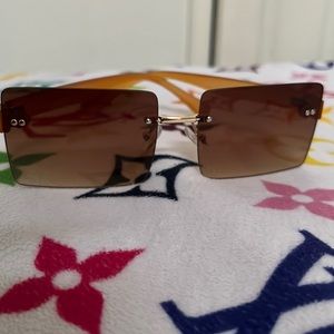 Tinted Lens Rimless Sunglasses